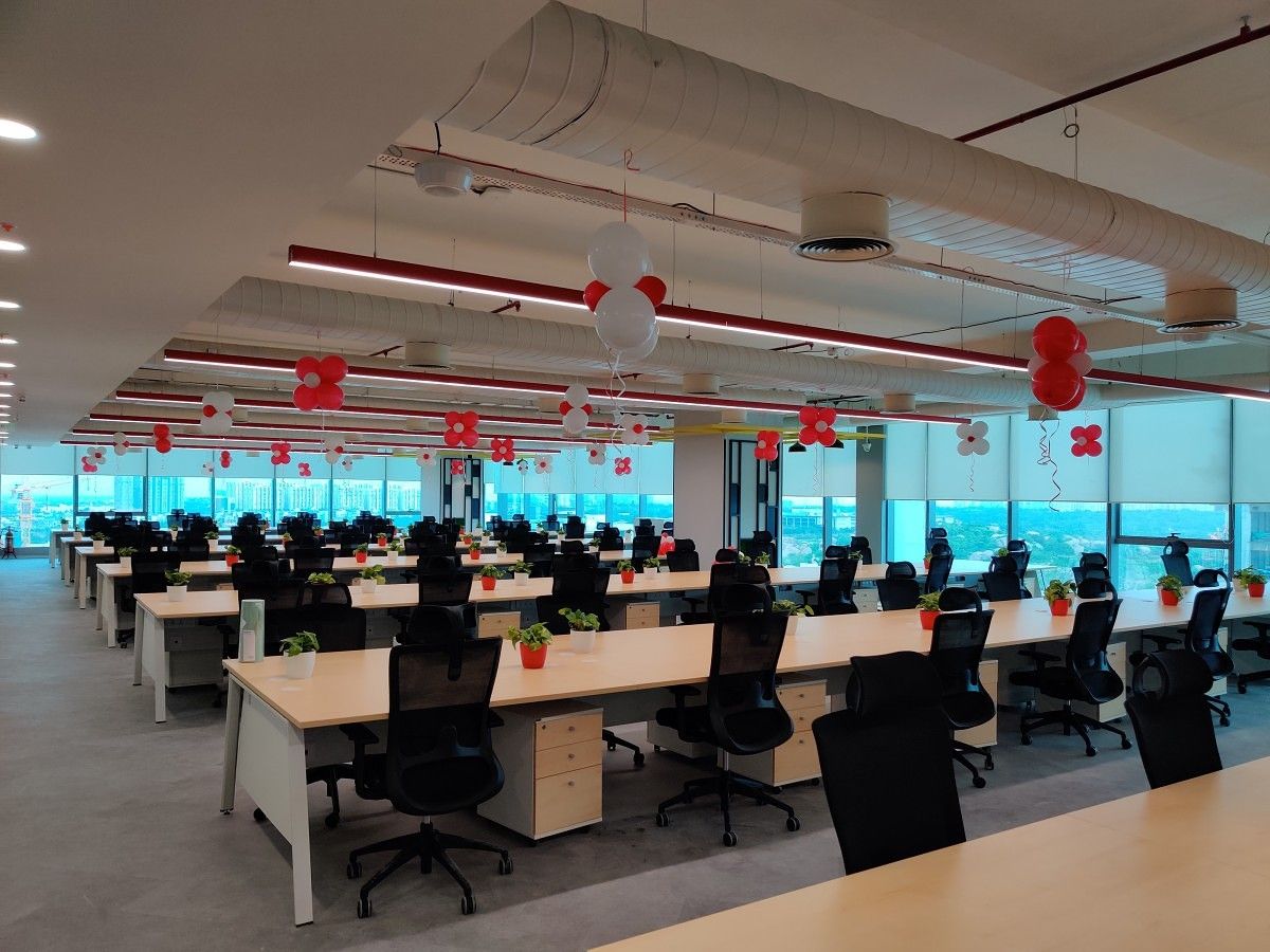 OnePlus India R&D Center in Hyderabad, showing chairs and common working area