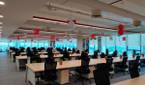 OnePlus India R&D Center in Hyderabad, showing chairs and common working area