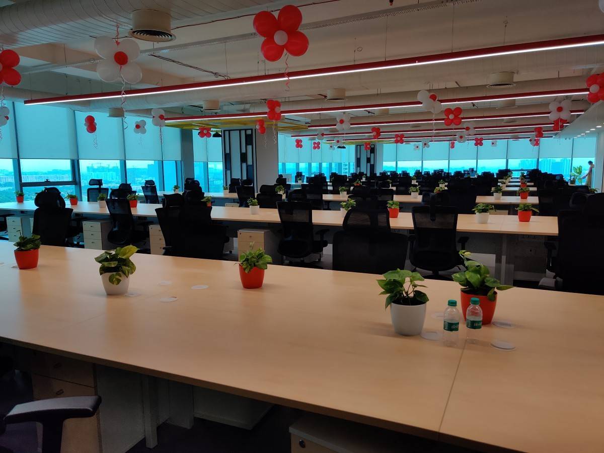 OnePlus India R&D Center in Hyderabad, showing chairs and common working area