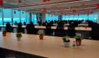 OnePlus India R&D Center in Hyderabad, showing chairs and common working area