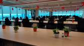 OnePlus India R&D Center in Hyderabad, showing chairs and common working area