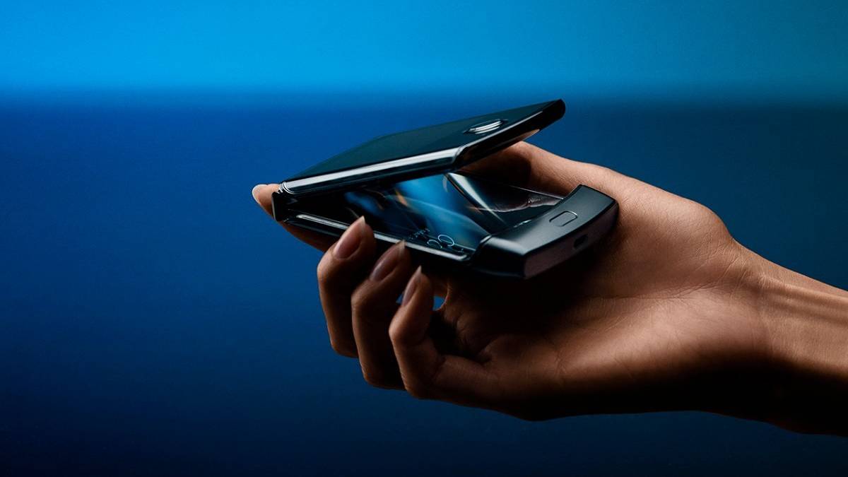 the Motorola Razr in the middle of flipping open.