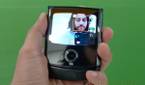 Taking a selfie with the Motorola Razr's small outside screen.