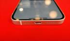 iPhone 12's aluminum railing.