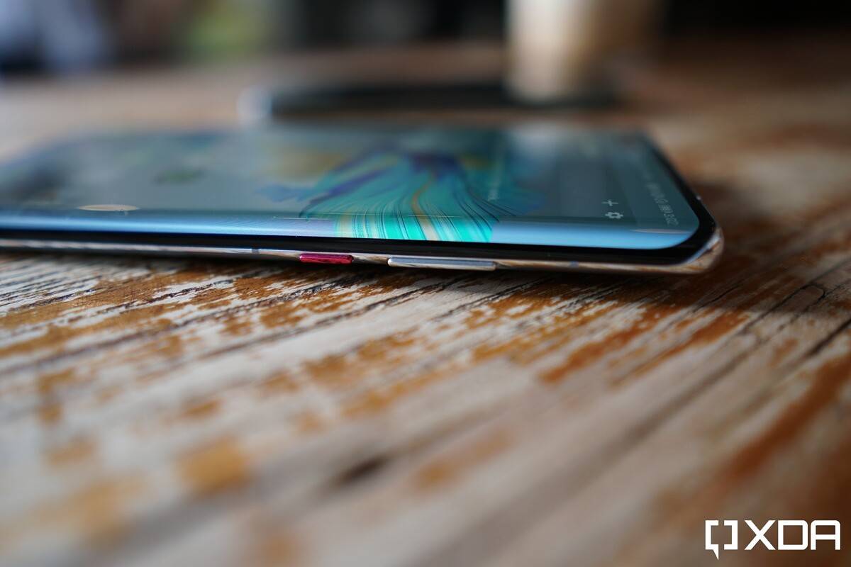 Mate 40 pro with a red power button.