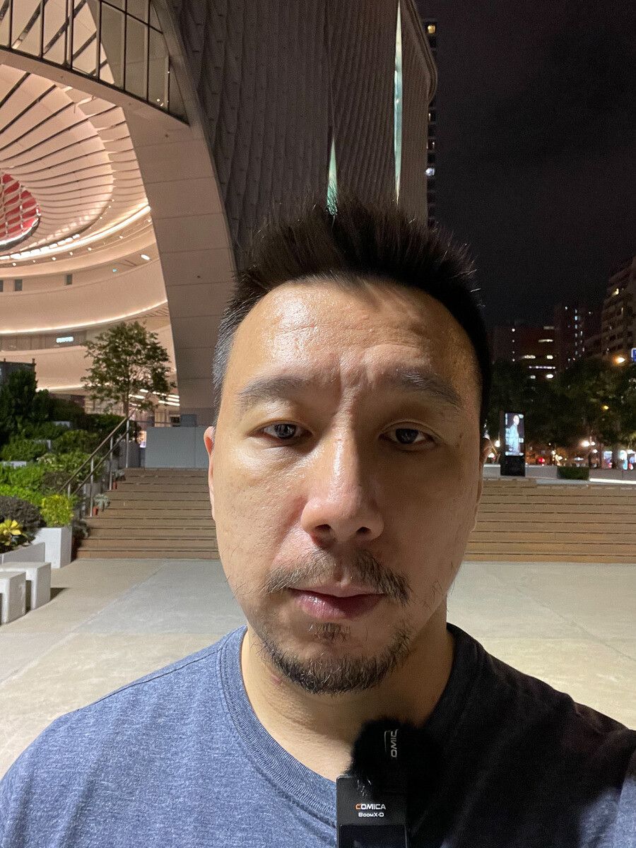 A selfie captured by the iPhone 12 during the night.