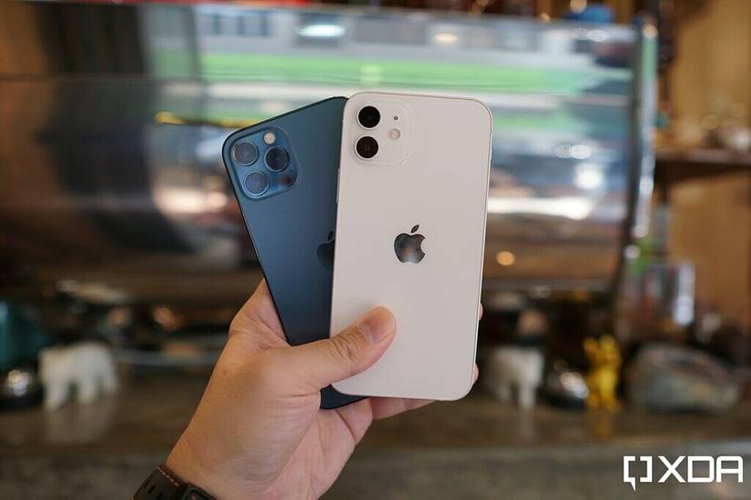 Holding two iPhones in one hand