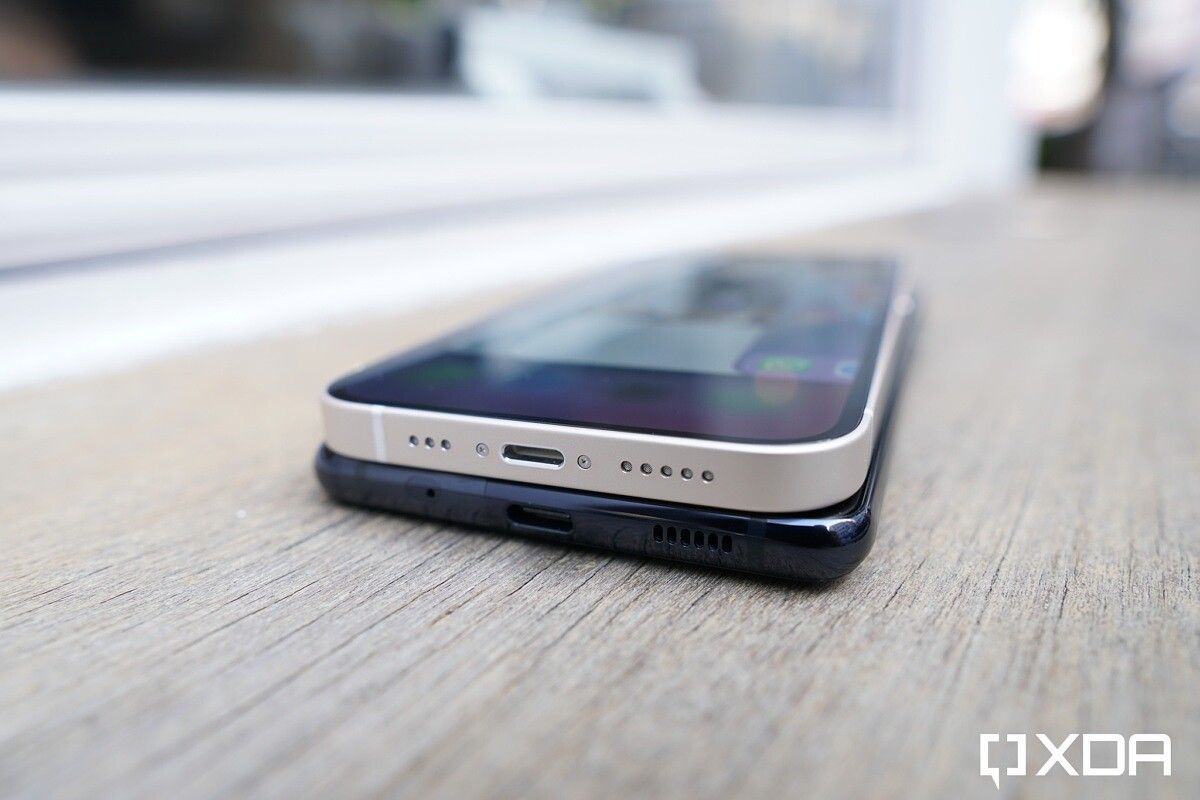 iPhone 12 and Galaxy S20 FE stacked on top of each other.