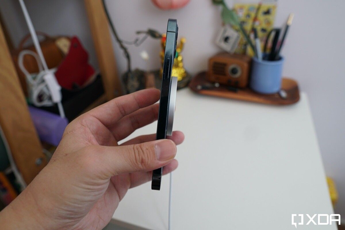 side profile of Apple MagSafe charger connected to the iPhone 12