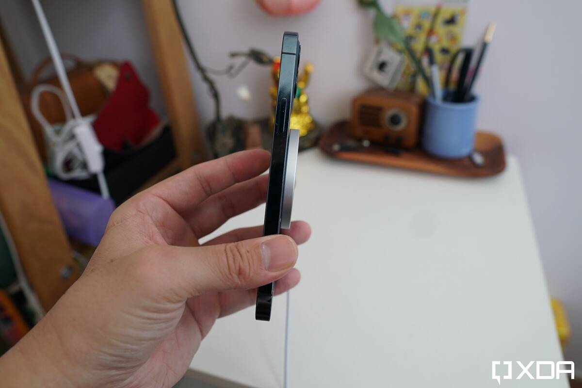 side profile of Apple MagSafe charger connected to the iPhone 12