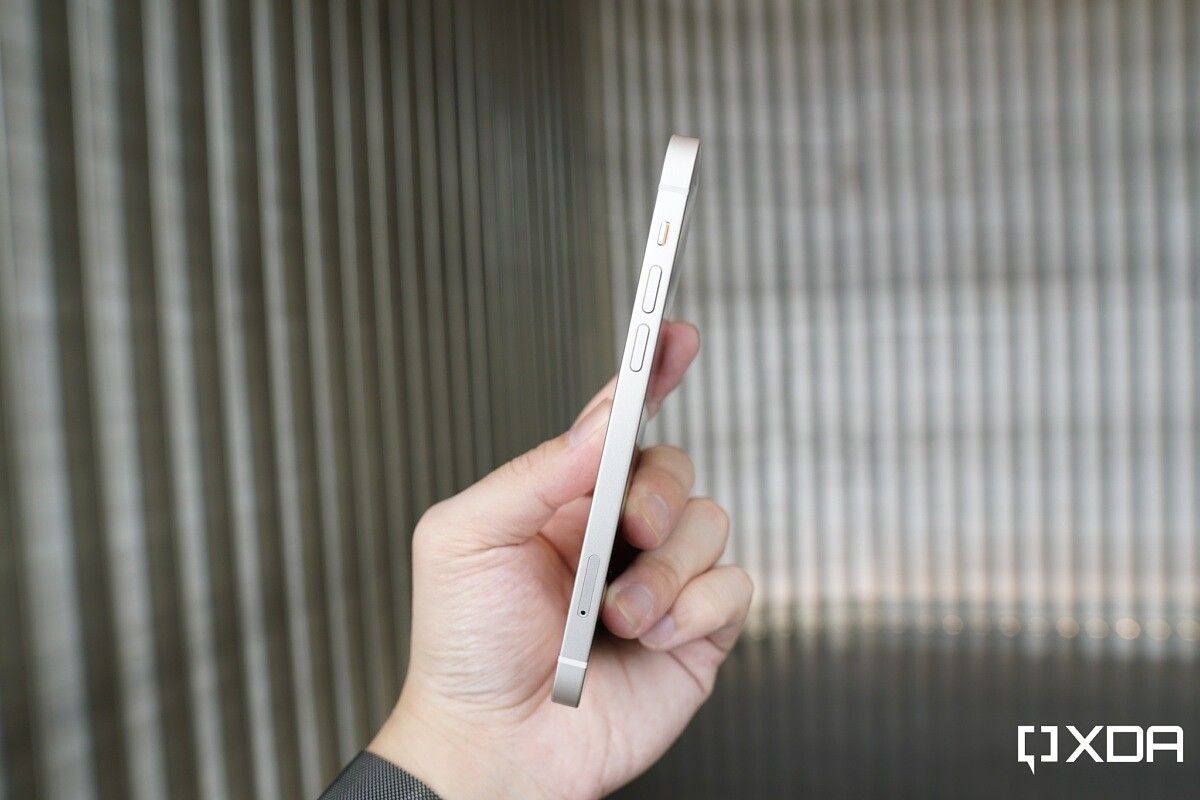 iphone in hand side view