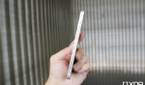 iphone in hand side view