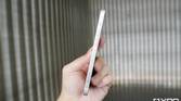 iphone in hand side view