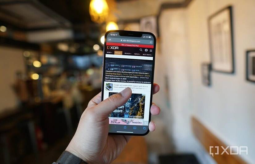 The iPhone 12 Pro Max in the hand. 