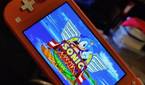 switch lite with Sonic Mania title screen