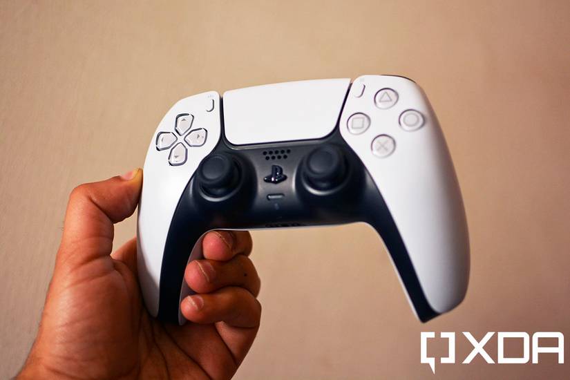 sony dualsense controller held in hand