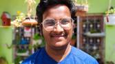 human portrait in front of plants clicked with Realme 8 Pro 108MP camera