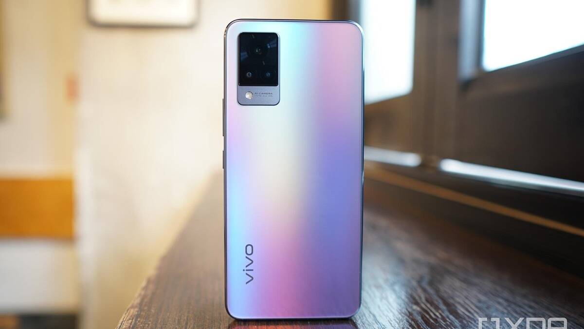 Vivo V21 standing upright on a table.
