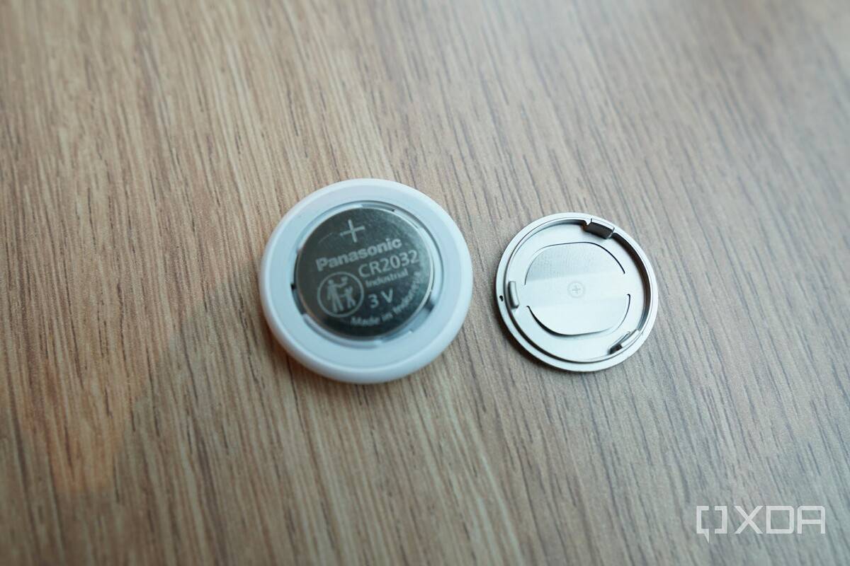 AirTag opened with a battery inside.