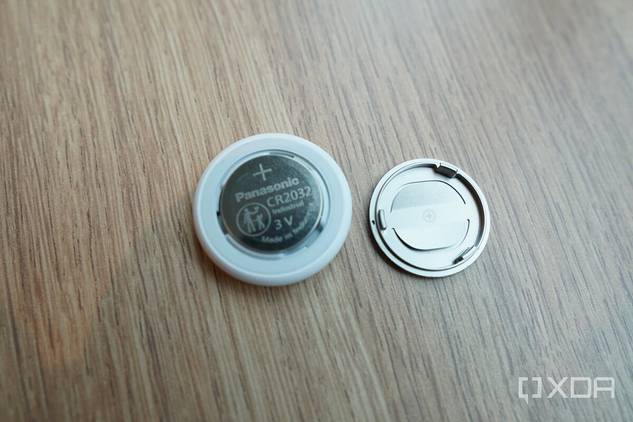 AirTag opened with a battery inside.