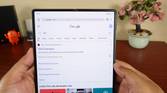Huawei Mate X2 held with both hands