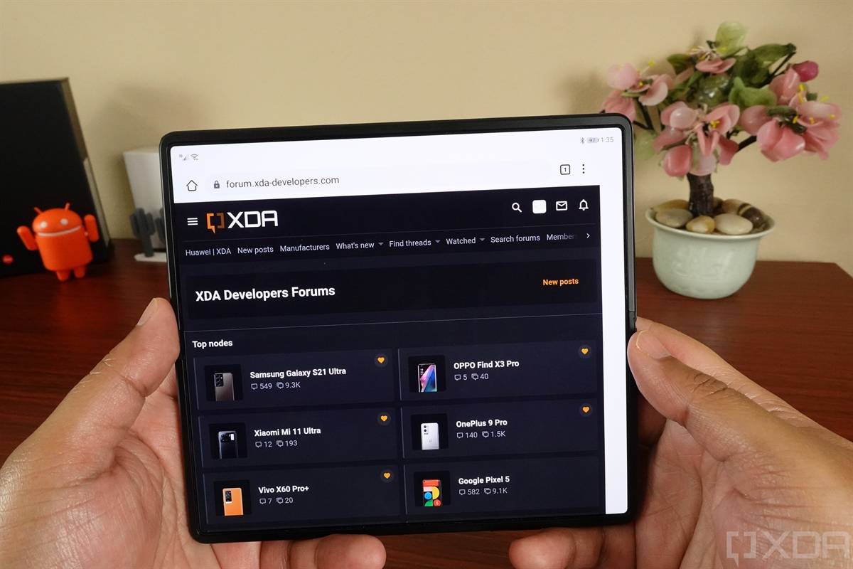 Huawei Mate X2 held with both hands