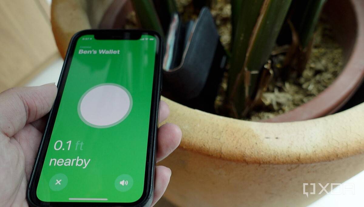 An iPhone 12 Mini locating an AirTag via Apple's Find My app
