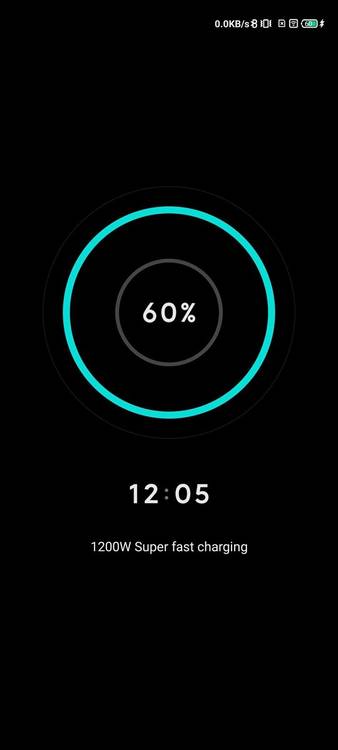 Custom charging screen with a blue circle, black background, and charging indicator in the center