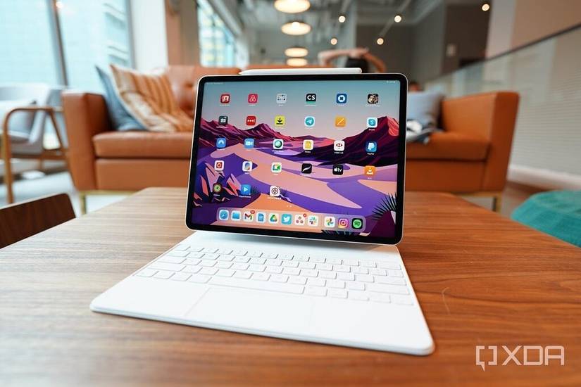 Apple's 2021 iPad Pro, 12.9-inch, with M1 processor and Magic Keyboard case and an Apple Pencil. 