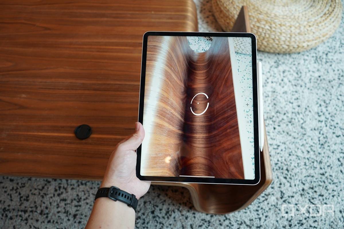 iPad Pro 2021's LIDAR scanner scanning the surface of a wooden table.