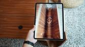 iPad Pro 2021's LIDAR scanner scanning the surface of a wooden table.