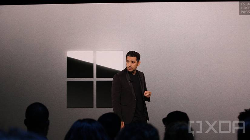 Panos Panay with Surface logo in background