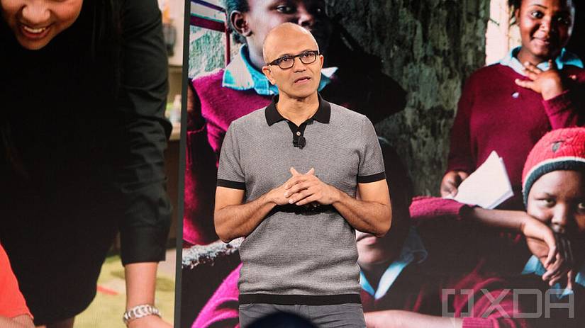Satya Nadella in front of pictures of children at EDU event