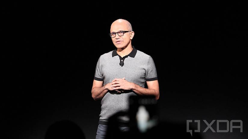 Satya Nadella on dark background