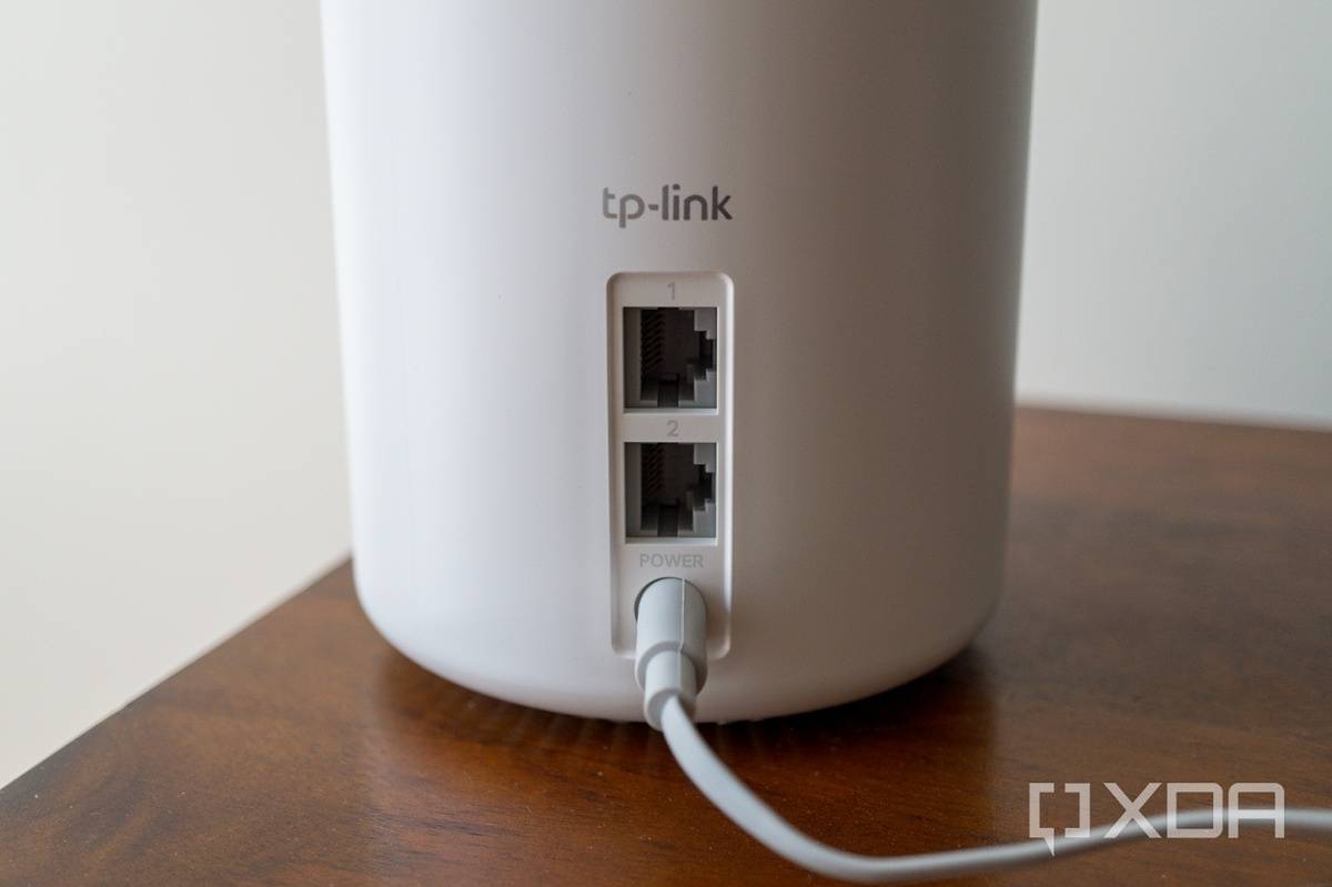 Photo of back of Deco X68, showing power connector and two LAN ports