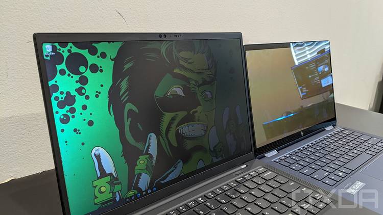 ThinkPad X1 Carbon next to HP Elite Dragonfly with privacy display on