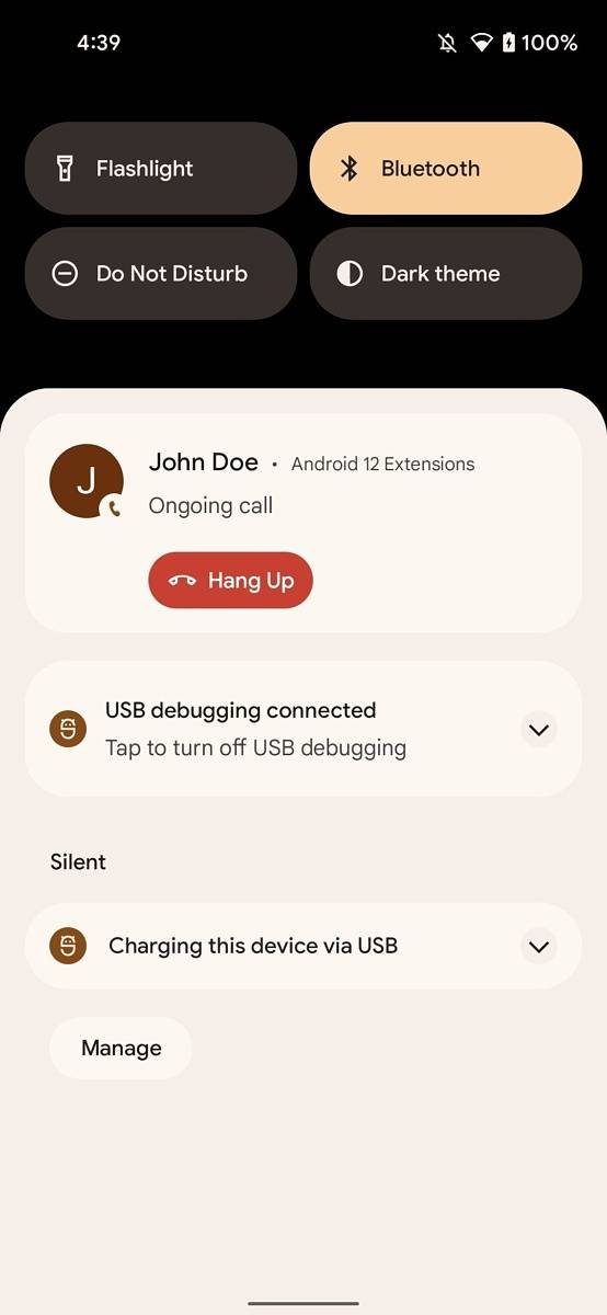 Android 12 Beta 2's notification shade displaying the on-going call view with a hang up button