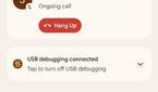 Android 12 Beta 2's notification shade displaying the on-going call view with a hang up button