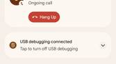 Android 12 Beta 2's notification shade displaying the on-going call view with a hang up button