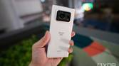 The Sharp Aquos R6 in white in the hand.
