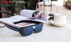 TCL NXTWEAR G glasses sitting on a table