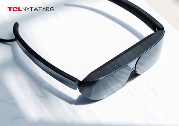 TCL NXTWEAR G glasses sitting on a table