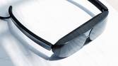 TCL NXTWEAR G glasses sitting on a table