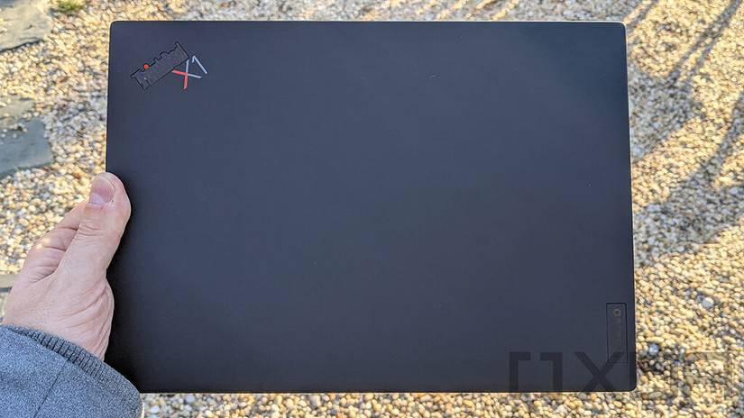 Hand holding Lenovo ThinkPad X1 Nano