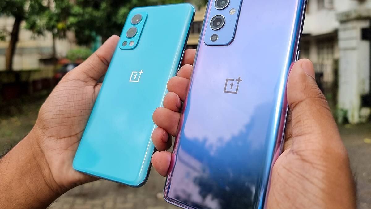 OnePlus Nord 2 and OnePlus 9 held out in hand