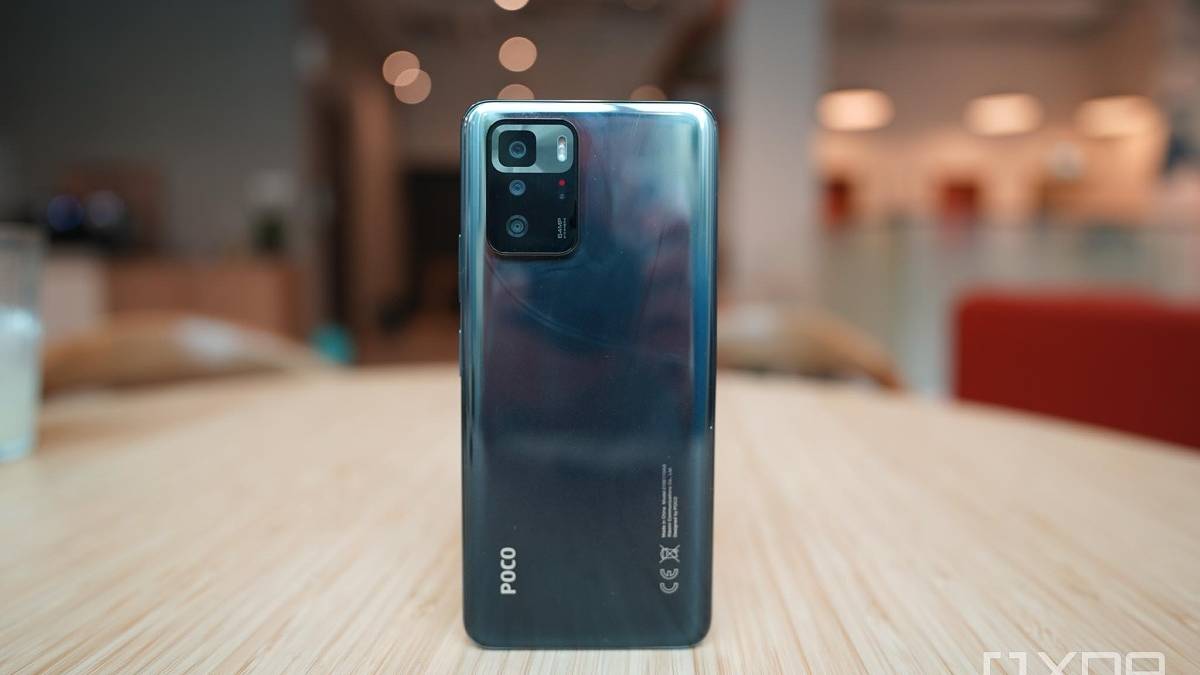 Black POCO X3 GT on wooden table
