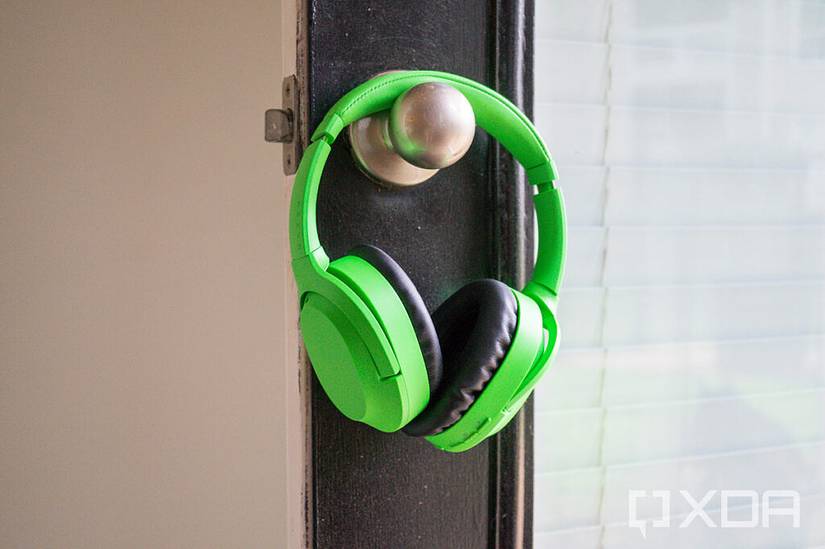 Razer headphones hanging on a doorknob