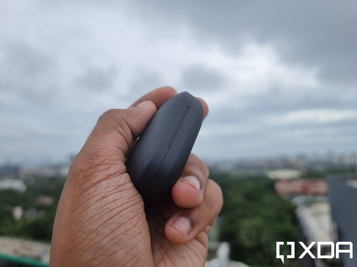 OnePlus Buds Pro case in hand
