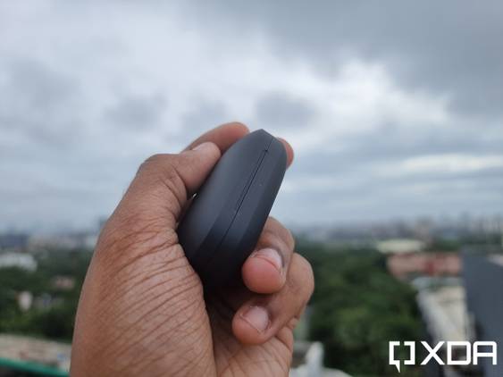 OnePlus Buds Pro case in hand