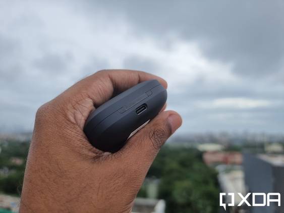 OnePlus Buds Pro case in hand